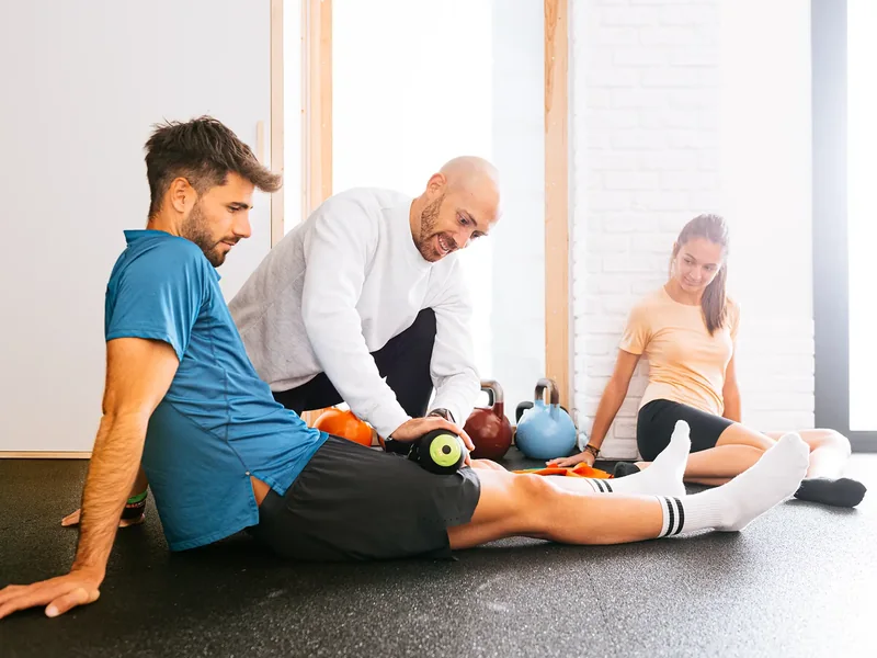 A physical therapist treating a patient