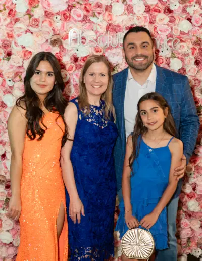 Dr. Andre Furtado with his wife and two daughters