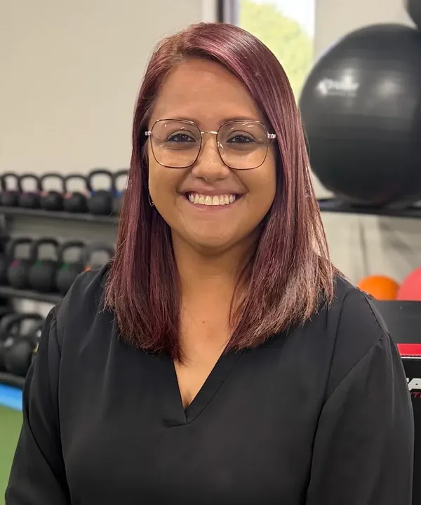 Portrait of Maribell Ramirez, Office Manager